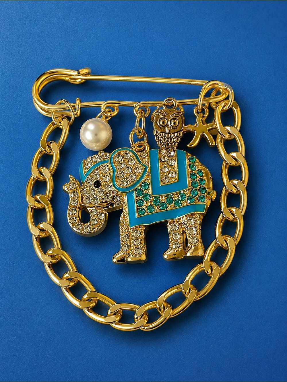 Gold-Tone Elephant Brooch with Turquoise Accents and Pearl Charm